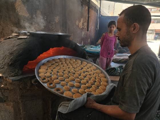 Eid traditions continue to be kept alive in Gaza KHAN YUNIS, GAZA, PALESTINE - MAY 26: A man cooks as preparations for Eid al-Adha continue in Khan Yunis, Gaza, Palestine, on May 26, 2026. Palestinian women are trying to keep the traditions alive under difficult conditions by preparing traditional Eid cookies made with dates and in ring shapes. Hani Alshaer Anadolu Khan Yunis Gaza. Editorial use only. Please get in touch for any other usage.  Copyright: x2026xAnadoluxHanixAlshaerx