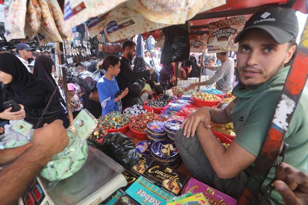 Palestinians walk through Gaza City market ahead of Eid al-Adha Palestinians walk through Al-Zawiya market in Gaza City on May 26, 2026, ahead of Eid al-Adha, as vendors display goods on temporary stalls. The market witnessed weak consumer demand and declining purchasing power amid worsening economic conditions caused by the ongoing war. Photo by Bilal Osama apaimages Gaza city Gaza Strip Palestinian Territory 260526_Gaza_BO_01(23) Copyright: xapaimagesxBilalxOsamax xapaimagesx