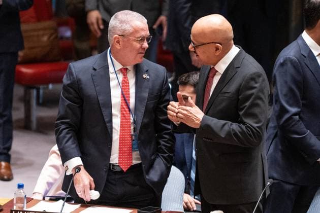 May 26, 2026, New York, New York, USA: Michael George DeSombre, Assistant Secretary of.State for East Asian and Pacific Affairs speaks with Abdullatif bin Rashid Al Zayani, Minister for Foreign Affairs of Bahrain before the Security Council meeting on Upholding the purposes and principles of the UN Charter and strengthening the UN-centered international system at UN Headquarters in New York, NY on May 26, 2026. China organized this meeting as it is a President of Security Council for the month of May. New York USA  - ZUMAr339 20260526_znp_r339_016 Copyright: xLevxRadinx