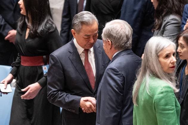 May 26, 2026, New York, New York, USA: Wang Yi, Member of the Political Bureau of the CPC Central Committee and Minister for Foreign Affairs of China speaks with Secretary-General Antonio Guterres before the Security Council meeting on Upholding the purposes and principles of the UN Charter and strengthening the UN-centered international system at UN Headquarters in New York, NY on May 26, 2026. China organized this meeting as it is a President of Security Council for the month of May. New York USA  - ZUMAr339 20260526_znp_r339_014 Copyright: xLevxRadinx