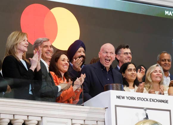 Chief Executive Officer Mastercard Michael Miebach and other representatives ring the Opening Bell at the New York Stock Exchange at the NYSE on Wall Street on Tuesday, May 26, 2026 in New York City. The S&P 500 and Nasdaq rose to new highs as shaky Iran War negotiations Continue.  NYP20260526113 JOHNxANGELILLO
