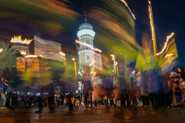 May 26, 2026, Banda Aceh, Aceh, Indonesia: Dozens of groups from various villages participated in a torchlight parade around the city to celebrate Eid al-Adha in Banda Aceh, Aceh Province, Indonesia, on Tuesday. The Indonesian government has officially declared Eid al-Adha 1447 Hijriah to fall on May 27, 2026. The torchlight parade, accompanied by the recitation of the Takbir (Islamic call to prayer), has become a Muslim tradition for celebrating the holiday and is a captivating spectacle for city residents. Banda Aceh Indonesia  - ZUMAi115 20260526_zip_i115_040 Copyright: xMuhammadxIqbalx