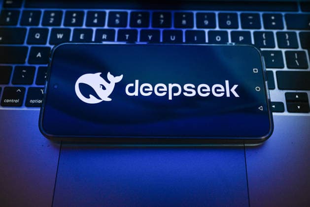 Illustration in Poland. In this photo illustration, a DeepSeek logo displayed on a smartphone on the top of a laptop. Poland Copyright: xOmarxMarquesx xSOPAxImagesx omarques_26052026_TECHPOL-6