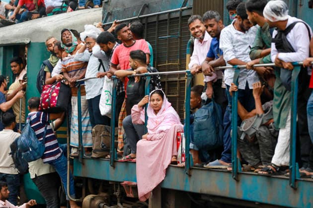 May 26, 2026, Tongi, Bangladesh: Bangladeshi Muslim passengers struggle to board an overcrowded train as they travel home ahead of the upcoming Eid al-Adha festival at a railway station in Tongi, near Dhaka, Bangladesh, Monday, May 26, 2024. Millions of people are expected to leave the capital in one of the countryÃ¢â‚¬â ¢s largest annual holiday exoduses to celebrate Eid with their families in rural areas. Tongi Bangladesh  - ZUMAd117 20260526_fap_d117_001 Copyright: xSuvraxKantixDasx