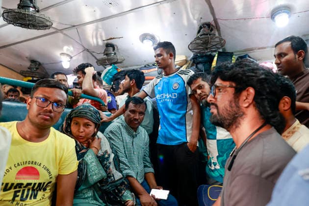May 26, 2026, Tongi, Bangladesh: Passengers travel aboard an overcrowded train as they head home ahead of the Eid al-Adha holiday in Tongi, near Dhaka, Bangladesh, Monday, May 26, 2024. Millions of people are leaving the capital to celebrate the Muslim festival with their families across the country. Tongi Bangladesh  - ZUMAd117 20260526_fap_d117_048 Copyright: xSuvraxKantixDasx