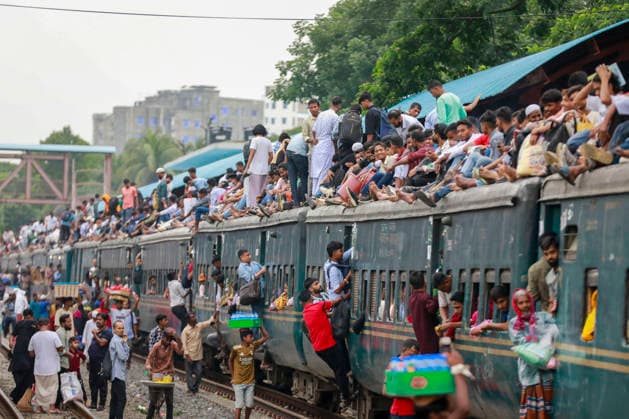 May 26, 2026, Tongi, Bangladesh: Bangladeshi Muslim passengers struggle to board an overcrowded train as they travel home ahead of the upcoming Eid al-Adha festival at a railway station in Tongi, near Dhaka, Bangladesh, Monday, May 26, 2024. Millions of people are expected to leave the capital in one of the countryÃ¢â‚¬â ¢s largest annual holiday exoduses to celebrate Eid with their families in rural areas. Tongi Bangladesh - ZUMAd117 20260526_fap_d117_009 Copyright: xSuvraxKantixDasx
