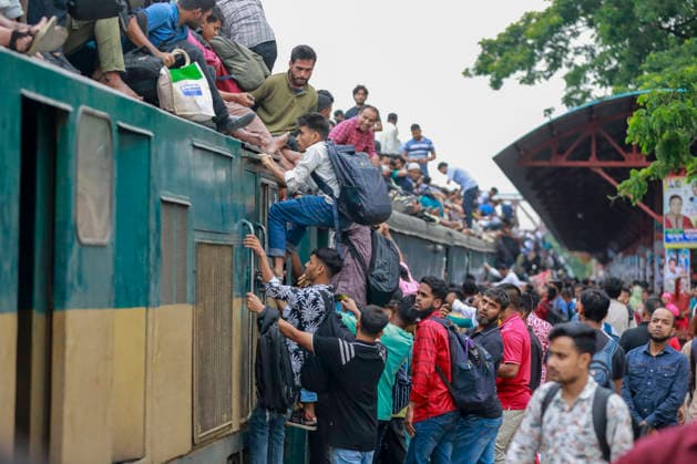 May 26, 2026, Tongi, Bangladesh: Bangladeshi Muslim passengers struggle to board an overcrowded train as they travel home ahead of the upcoming Eid al-Adha festival at a railway station in Tongi, near Dhaka, Bangladesh, Monday, May 26, 2024. Millions of people are expected to leave the capital in one of the countryÃ¢â‚¬â ¢s largest annual holiday exoduses to celebrate Eid with their families in rural areas. Tongi Bangladesh - ZUMAd117 20260526_fap_d117_010 Copyright: xSuvraxKantixDasx