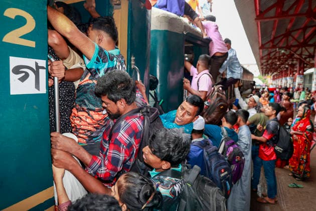 May 26, 2026, Tongi, Bangladesh: Bangladeshi Muslim passengers struggle to board an overcrowded train as they travel home ahead of the upcoming Eid al-Adha festival at a railway station in Tongi, near Dhaka, Bangladesh, Monday, May 26, 2024. Millions of people are expected to leave the capital in one of the countryÃ¢â‚¬â ¢s largest annual holiday exoduses to celebrate Eid with their families in rural areas. Tongi Bangladesh  - ZUMAd117 20260526_fap_d117_039 Copyright: xSuvraxKantixDasx