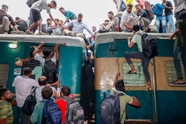 May 26, 2026, Tongi, Bangladesh: Bangladeshi Muslim passengers struggle to board an overcrowded train as they travel home ahead of the upcoming Eid al-Adha festival at a railway station in Tongi, near Dhaka, Bangladesh, Monday, May 26, 2024. Millions of people are expected to leave the capital in one of the countryÃ¢â‚¬â ¢s largest annual holiday exoduses to celebrate Eid with their families in rural areas. Tongi Bangladesh - ZUMAd117 20260526_fap_d117_032 Copyright: xSuvraxKantixDasx