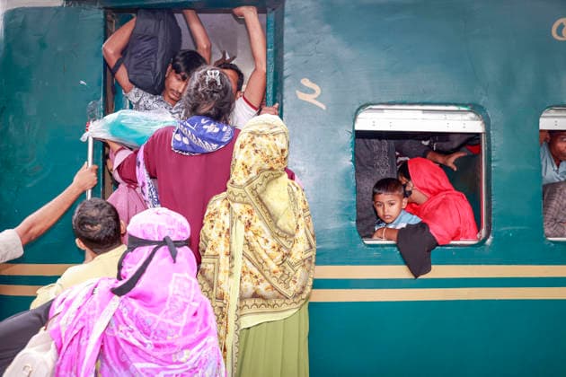 May 26, 2026, Tongi, Bangladesh: Bangladeshi Muslim passengers struggle to board an overcrowded train as they travel home ahead of the upcoming Eid al-Adha festival at a railway station in Tongi, near Dhaka, Bangladesh, Monday, May 26, 2024. Millions of people are expected to leave the capital in one of the countryÃ¢â‚¬â ¢s largest annual holiday exoduses to celebrate Eid with their families in rural areas. Tongi Bangladesh - ZUMAd117 20260526_fap_d117_035 Copyright: xSuvraxKantixDasx