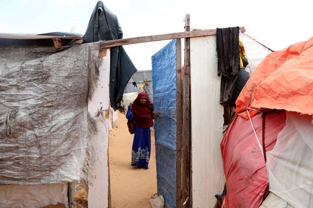 Camps turn into permanent settlements amid ongoing crisis in Somalia MOGADISHU, SOMALIA - MAY 26: A girl is seen as millions of people living in camps that have gradually turned into permanent settlements, where they continue to face difficult living conditions amid insecurity, conflict and drought in the capital Mogadishu, Somalia, on May 26, 2026. Metin Yuksel Kaya Anadolu Mogadishu Somalia. Editorial use only. Please get in touch for any other usage.  Copyright: x2026xAnadoluxMetinxYukselxKayax
