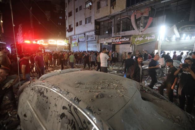 Palestinians inspect Israeli airstrike site in Gaza City Palestinians gather in a street to inspect the site of an Israeli airstrike on a residential building in Gaza City, on May 26, 2026. Photo by Belal Osama apaimages Gaza Gaza Strip Palestinian Territory 260526_Gaza_BO_2_00(4) Copyright: xapaimagesxBelalxOsamax xapaimagesx