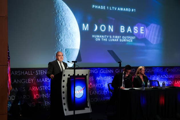 May 26, 2026, Washington, District Of Columbia, USA: Joined onstage by NASA Administrator JARED ISAACMAN and LORI GLAZE, Acting Associate Administrator, Exploration Systems Development Mission Directorate, NASA, CARLOS GARCIA-GALAN, Program Executive, Moon Base, NASA, left at podium, speaks at a press conference announcing Moon Base plans and mission progress at NASA Headquarters in Washington, D.C. on May 26, 2026. NASA s Moon Base program is a long-term lunar exploration and infrastructure initiative designed to enable sustained human presence at the lunar South Pole. Washington USA - ZUMAd227 20260526_znp_d227_033 Copyright: xBryanxDozierx