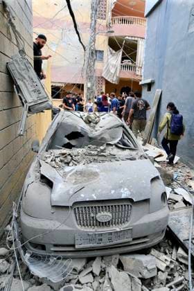 (260527) -- TYRE, May 27, 2026 -- This photo taken on May 26, 2026 shows a car destroyed by an Israeli airstrike in Tyre, Lebanon. Israeli strikes on southern and eastern Lebanon killed at least 18 people and wounded more than 20 others on Tuesday, according to Lebanon s official sources, as Israel intensified its bombardment campaign across southern Lebanon. (Photo by Xinhua) LEBANON-TYRE-ISRAELI RAID AlixHashisho 