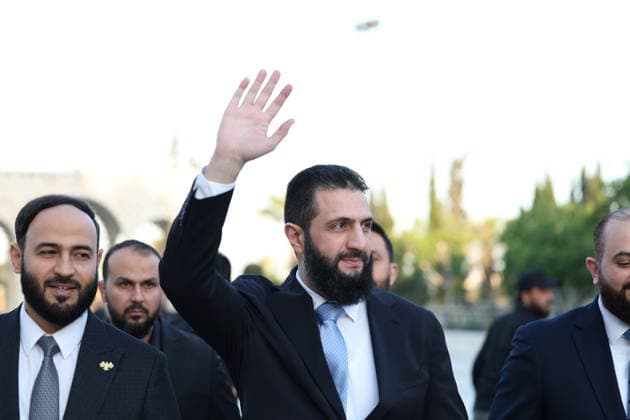 Syrian President Ahmed al-Sharaa Attends Eid al-Adha Prayers Syria, Aleppo - May 27, 2026: ALEPPO, SYRIA - MAY 27, 2026: Syrian President Ahmed al-Sharaa waves and greets citizens while on his way to perform the traditional Eid al-Adha holiday prayers at a local mosque in Aleppo city. Aleppo Syria Copyright: xMohammadxBashirxAldaherx