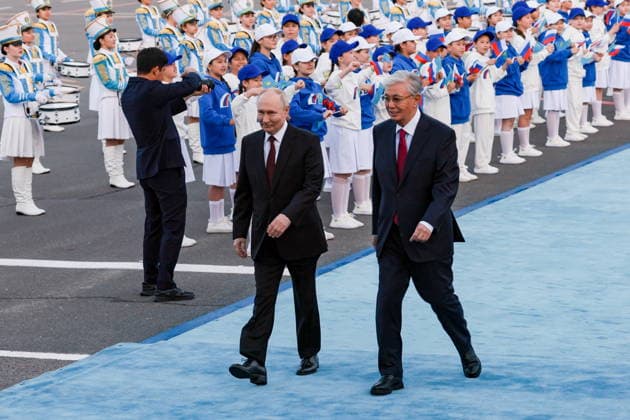 KAZAKHSTAN, ASTANA - MAY 27, 2026: Russia s President Putin and Kazakhstan s President Kassym-Jomart Tokayev (L-R front) are seen during a ceremony marking Putin s arrival at Nursultan Nazarbayev International Airport. The Russian president arrived in Kazakhstan on a state visit. Alexander Shcherbak TASS  93101373