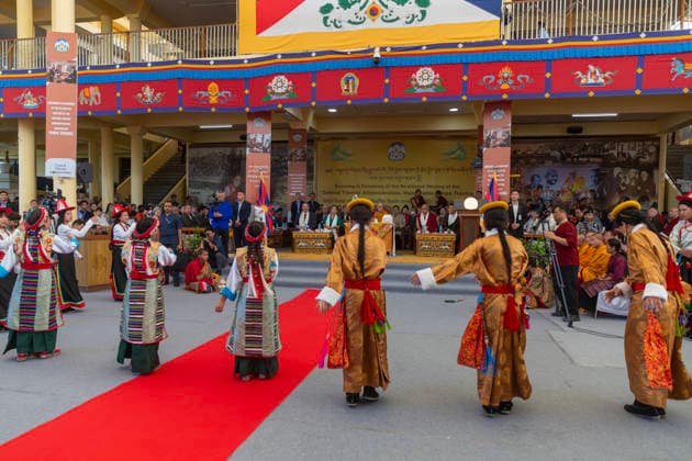 May 27, 2026, Dharamshala, Himachal Pradesh, India: Artist from TIPA perform dance as Tibetan Spiritual Leader the Dalai Lama (c), newly re-elected Sikyong Penpa Tsering (1st R), sitting on the dice with other dignitaries during Swearing-in Ceremony of the re-elected Sikyong of the Central Tibetan Administration (CTA) Penpa Tsering at Tsugla Khang Temple, Mcleodganj, Dharamshala on Wednesday...NOTE; EDITORIAL USE ONLY. Dharamshala India  - ZUMAb235 20260527_zip_b235_010 Copyright: xShaileshxBhatnagarx