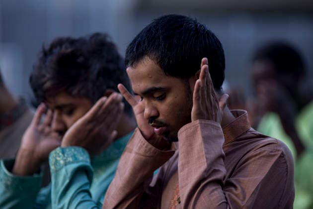 Eid al-Adha in Madrid, Spain - 27 May 2026 A member of the Muslim community in Madrid brings his hands to his face, during the celebration of the Feast of the Sacrifice, Eid al-Adha, in the Casino de la Reina park in the Lavapiés neighborhood. Eid al-Adha is a festival that symbolizes devotion and gratitude to God (Allah). Madrid Spain Copyright: xLuisxSotox xSOPAxImagesx LSOTOEID11