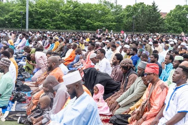 May 27, 2026, New York, New York, USA: Men pray with Mayor Zohran Mamdani during Eid Al-Adha holiday prayers at The Yancy Track & Field in New York, NY on May 27, 2026. Hundreds of men, women and children attended wearing clean, colorful and expensive traditional clothes. Eid al-Adha translates from Arabic to Festival of Sacrifice is one of the most important holidays in the Islamic calendar. It honors the Prophet Ibrahim s (Abraham s in Judaism) absolute obedience to God, commemorating his willingness to sacrifice his son as an act of submission before God provided a ram to sacrifice instead. New York USA - ZUMAr339 20260527_znp_r339_006 Copyright: xLevxRadinx