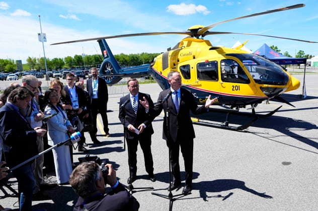 May 27, 2026, Ottawa, On, CANADA: Canada s Minister of National Defence David McGuinty, right, and German s Minister of Defence Boris Pistorius, left, participate in a joint media availability in front of a CT-153 Juno (Airbus H135) helicopter, at the Canadian Association of Defence and Security Industries annual defence industry trade show CANSEC, in Ottawa, on Wednesday, May 27, 2026. Ottawa CANADA  - ZUMAc35_ 20260527_zaf_c35_078 Copyright: xJustinxTangx