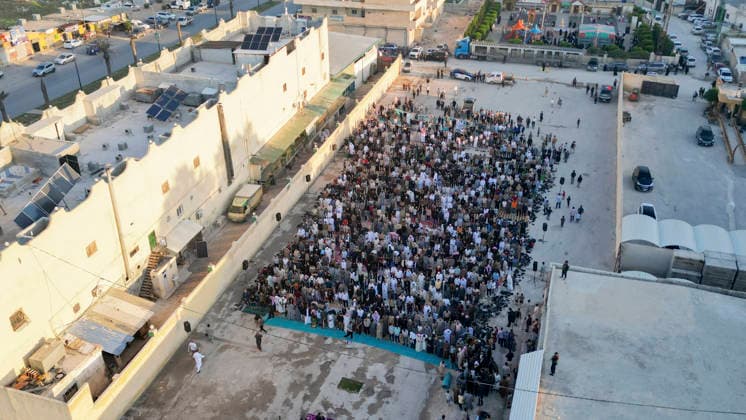 Eid Al-Adha Prayers Idlib An aerial view shows a large crowd of worshipers performing Eid al-Adha prayers in Idlib, Syria, on May 27, 2026. Eid al-Adha, or the Feast of Sacrifice, is one of the most important holidays in the Islamic calendar, commemorating the willingness of Prophet Ibrahim to sacrifice his son. The event is traditionally marked worldwide by communal prayers, family gatherings, acts of charity, and the slaughtering of livestock. Idlib Idlib Syria Copyright: xOmarxAlbawx