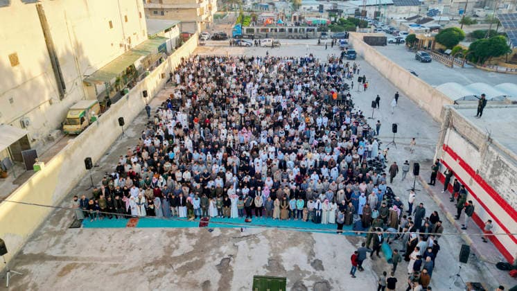 Eid Al-Adha Prayers Idlib An aerial view shows a large crowd of worshipers performing Eid al-Adha prayers in Idlib, Syria, on May 27, 2026. Eid al-Adha, or the Feast of Sacrifice, is one of the most important holidays in the Islamic calendar, commemorating the willingness of Prophet Ibrahim to sacrifice his son. The event is traditionally marked worldwide by communal prayers, family gatherings, acts of charity, and the slaughtering of livestock. Idlib Idlib Syria Copyright: xOmarxAlbawx