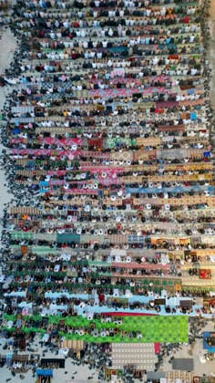 Eid Al-Adha Prayers Idlib An aerial view shows a large crowd of worshipers performing Eid al-Adha prayers in Idlib, Syria, on May 27, 2026. Eid al-Adha, or the Feast of Sacrifice, is one of the most important holidays in the Islamic calendar, commemorating the willingness of Prophet Ibrahim to sacrifice his son. The event is traditionally marked worldwide by communal prayers, family gatherings, acts of charity, and the slaughtering of livestock. Idlib Idlib Syria Copyright: xOmarxAlbawx