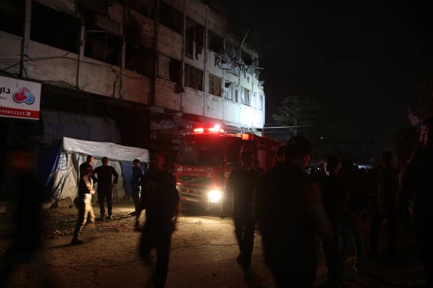 Israeli airstrike in Gaza kills 7 Palestinians GAZA CITY, GAZA, PALESTINE - MAY 27: Palestinian search and rescue teams, firefighters and medical crews are dispatched to the area following the Israeli attack on Omar Mukhtar Street which killed 7 Palestinians and injured 18 in Gaza City, Gaza, Palestine on May 27, 2026. Anas Zeyad Fteha Anadolu Gaza City Gaza. Editorial use only. Please get in touch for any other usage.  Copyright: x2026xAnadoluxAnasxZeyadxFtehax
