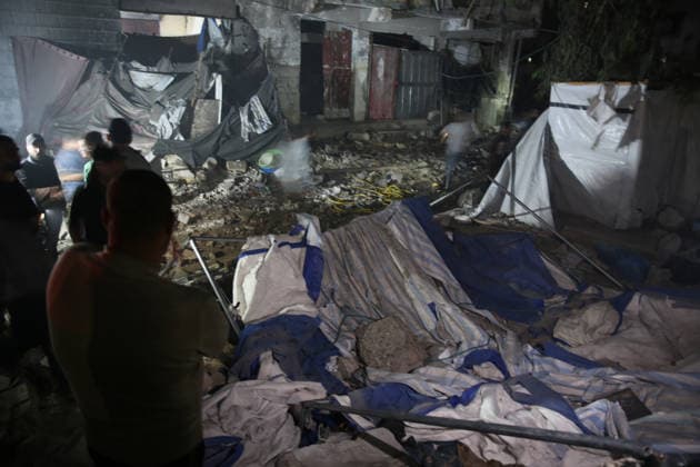Israeli airstrike in Gaza kills 7 Palestinians GAZA CITY, GAZA, PALESTINE - MAY 27: Palestinian search and rescue teams, firefighters and medical crews are dispatched to the area following the Israeli attack on Omar Mukhtar Street which killed 7 Palestinians and injured 18 in Gaza City, Gaza, Palestine on May 27, 2026. Anas Zeyad Fteha Anadolu Gaza City Gaza. Editorial use only. Please get in touch for any other usage.  Copyright: x2026xAnadoluxAnasxZeyadxFtehax