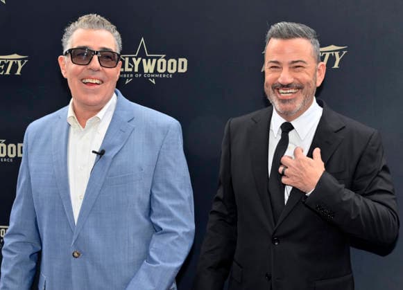 Comedy, actor, radio personality and television host Adam Corolla (L) is joined by Jimmy Kimmel during an unveiling ceremony honoring him with the 2,846th star on the Hollywood Walk of Fame in Los Angeles on Wednesday, May 27, 2026.  LAP2026052717 JIMxRUYMEN
