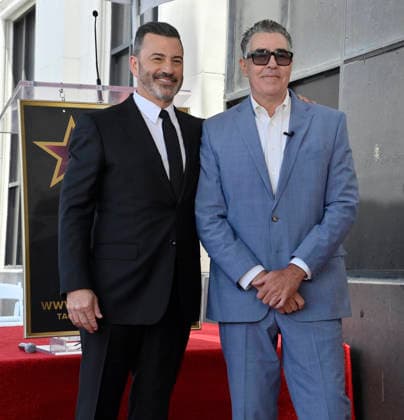 Comedy, actor, radio personality and television host Adam Corolla is joined by Jimmy Kimmel (L) during an unveiling ceremony honoring him with the 2,846th star on the Hollywood Walk of Fame in Los Angeles on Wednesday, May 27, 2026.  LAP2026052709 JIMxRUYMEN