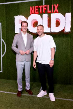 NRW-Ministerpräsident Hendrik Wüst (CDU) und Fußballspieler Lukas Podolski bei der Premiere der Netflix-Doku Poldi im RheinEnergieStadion. Köln, 27.05.2026 NRW Deutschland *** NRW Minister President Hendrik Wüst CDU and soccer player Lukas Podolski at the premiere of the Netflix documentary Poldi in the RheinEnergieStadion Cologne, 27 05 2026 NRW Germany Copyright: xChristophxHardtx