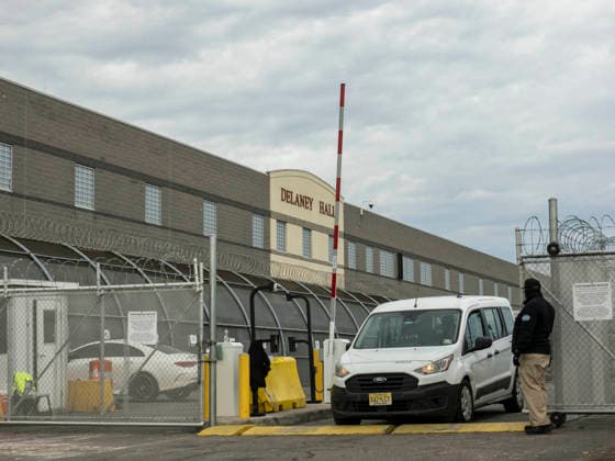 May 27, 2026, Newark, New Jersey, USA: A guard allows a vehicle to pass through one of the Delaney Hall ICE detention center gates. Inside the facility detainees continue a hunger and labor strike over inhumane conditions and due process violations. ICE agents and those protesting detainee transfers and the conditions inside have violently clashed as protestors have tried to barricade the exits with their bodies. Newark USA - ZUMAd155 20260527_znp_d155_004 Copyright: xSuexDorfmanx