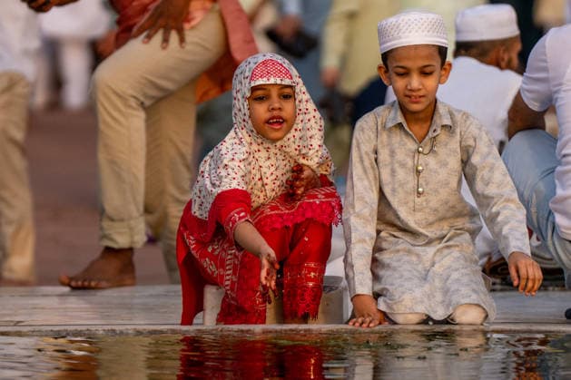 Eid al-Adha in India NEW DELHI, INDIA - MAY 28: Children enjoy themselves after offering Eid al-Adha prayers at Jama Masjid in New Delhi, India, on May 28, 2026. Amarjeet Kumar Singh Anadolu New Delhi India. Editorial use only. Please get in touch for any other usage.  Copyright: x2026xAnadoluxAmarjeetxKumarxSinghx