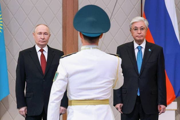 KAZAKHSTAN, ASTANA - MAY 28, 2026: Russia s President Vladimir Putin (L) and Kazakhstan s President Kassym-Jomart Tokayev (R) pose during a welcome ceremony at the Independence Palace. Alexander Shcherbak TASS  93123238