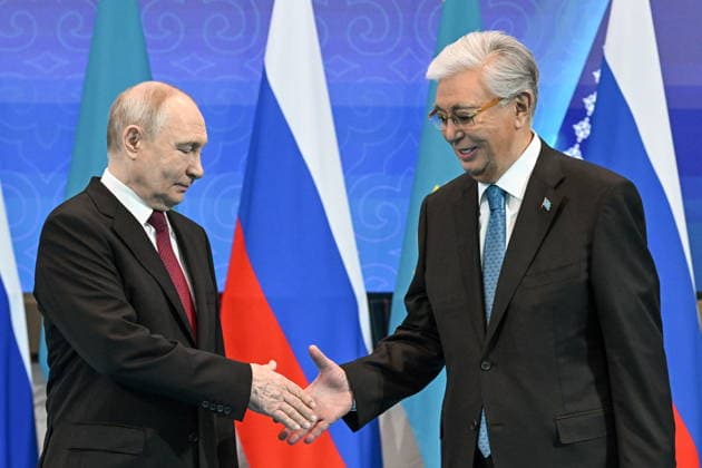 KAZAKHSTAN, ASTANA - MAY 28, 2026: Russia s President Vladimir Putin (L) and Kazakhstan s President Kassym-Jomart Tokayev shake hands during a meeting at the Independence Palace. Sergei Bobylev TASS  93124942