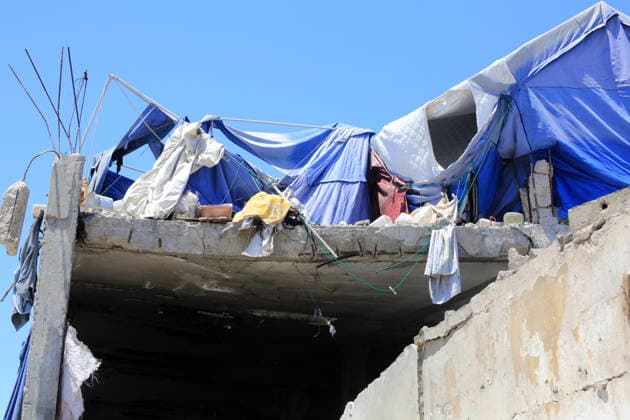 Displaced Palestinians inspect damage after deadly Israeli strike in Gaza City Displaced Palestinians inspect their damaged homes and tents following an Israeli strike that targeted a residential apartment in Gaza City on May 28, 2026. The strike, which took place the previous night, killed 10 Palestinians and wounded others, according to local sources, while causing severe damage to the targeted building and nearby tents sheltering displaced people. Photo by Anas Nour apaimages Gaza city Gaza Strip Palestinian Territory 280526_Gaza_AN_00(31) Copyright: xapaimagesxAnasxNourx xapaimagesx