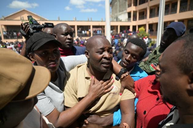 (260528) -- NAKURU, May 28, 2026 -- A relative of a girl who died in a fire that took place at Utumishi Girls Academy cries at the site of the accident in Gilgil, Nakuru County, Kenya, on May 28, 2026. The death toll from an early-morning fire in northwestern Kenya rose to 16 after six more students succumbed to their injuries, police confirmed on Thursday. The fire broke out at around 1:00 a.m. Thursday local time (2200 GMT Wednesday) while the students were asleep in the dormitory at Utumishi Girls Academy in Gilgil, Nakuru County, initially claiming 10 lives before the toll rose. Meanwhile, more than 70 remain hospitalized with injuries of varying severity. A police report said that most of the injured are currently in stable cond 