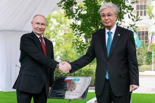 KAZAKHSTAN, ASTANA - MAY 28, 2026: Russia s President Vladimir Putin (L) and Kazakhstan s President Kassym-Jomart Tokayev shake hands during a tree-planting ceremony on the Alley of Eternal Friendship between Russia and Kazakhstan. Alexander Shcherbak TASS  93130275