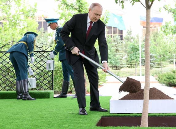 KAZAKHSTAN, ASTANA - MAY 28, 2026: Russia s President Vladimir Putin takes part in a tree-planting ceremony on the Alley of Eternal Friendship between Russia and Kazakhstan. Alexander Kazakov Russian Presidential Press and Information Office TASS  93130603