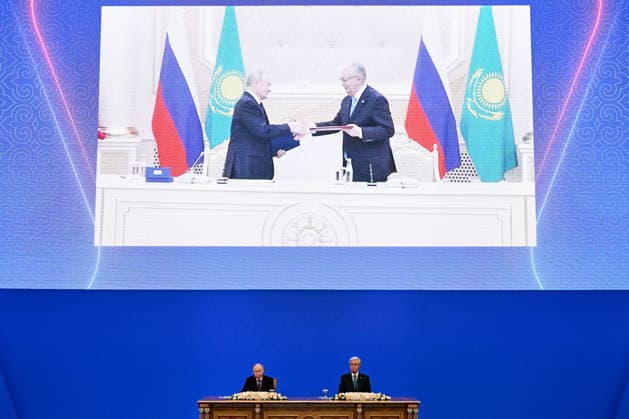 KAZAKHSTAN, ASTANA - MAY 28, 2026: Russia s President Vladimir Putin (L) and Kazakhstan s President Kassym-Jomart Tokayev are seen during a ceremony to sign joint documents at the Independence Palace. Sergei Bobylev TASS  93130833