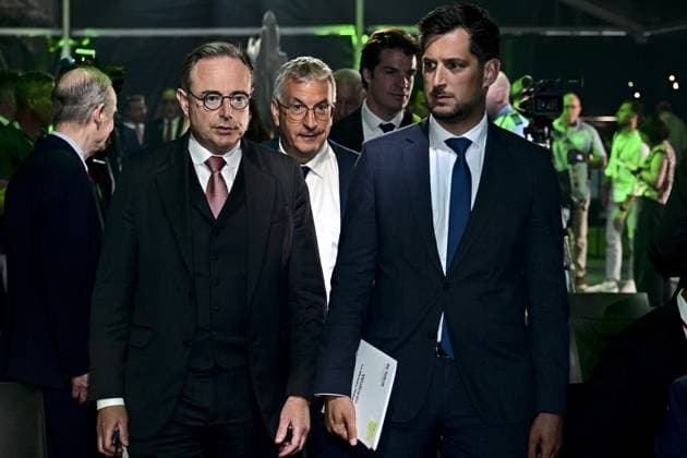Prime Minister Bart De Wever, MR s Pierre-Yves Jeholet and Walloon Minister President Adrien Dolimont pictured during the official opening of the new production line dedicated to the F-35 program of aerospace company Sonaca, on Thursday 28 May 2026 in Sonacas site in Gosselies, Charleroi.  DIRKxWAEM 175257950