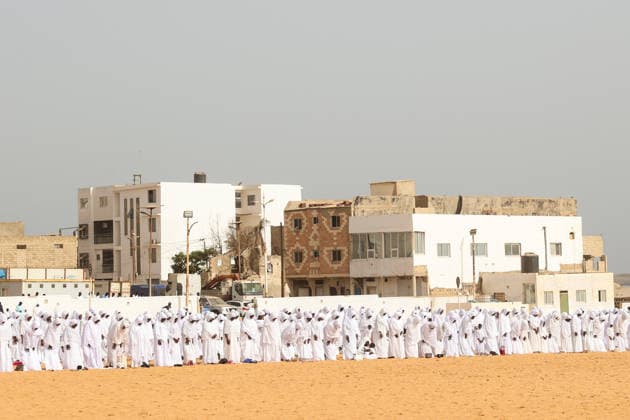 Eid al-Adha prayer on the beach in Dakar DAKAR, SENEGAL - MAY 28: Followers of the Layene order perform the Eid al-Adha prayer dressed in white on the beach in Dakar, Senegal where the first day of Eid al-Adha is being observed today on May 28, 2026. In the Yoff district of the capital Dakar, thousands gathered on the beach around the tomb of Seydina Limamou Laye, the founder of the Layene order, for the Eid prayer. Cem Ozdel Anadolu Dakar Senegal. Editorial use only. Please get in touch for any other usage.  Copyright: x2026xAnadoluxCemxOzdelx