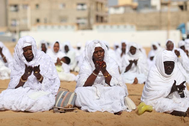 Eid al-Adha prayer on the beach in Dakar DAKAR, SENEGAL - MAY 28: Followers of the Layene order perform the Eid al-Adha prayer dressed in white on the beach in Dakar, Senegal where the first day of Eid al-Adha is being observed today on May 28, 2026. In the Yoff district of the capital Dakar, thousands gathered on the beach around the tomb of Seydina Limamou Laye, the founder of the Layene order, for the Eid prayer. Cem Ozdel Anadolu Dakar Senegal. Editorial use only. Please get in touch for any other usage.  Copyright: x2026xAnadoluxCemxOzdelx