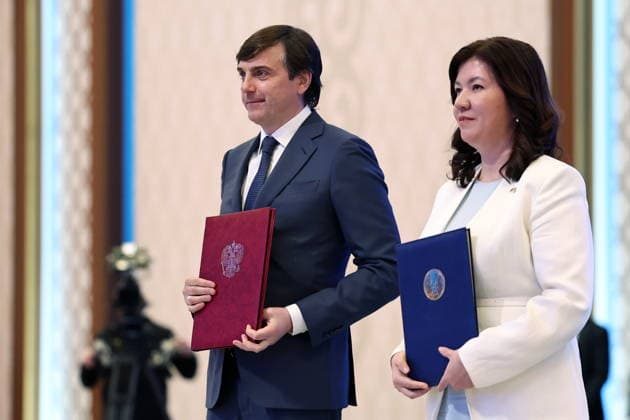 KAZAKHSTAN, ASTANA - MAY 28, 2026: Russia s Minister of Education Sergei Kravtsov and Kazakhstan s Minister of Education Juldyz Suleimenova (L-R front) pose during a ceremony to sign joint documents at the Independence Palace. Alexander Kazakov Russian Presidential Press and Information Office TASS  93134035