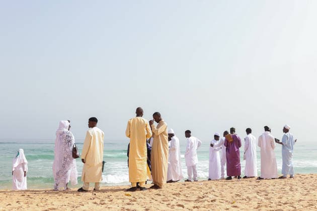 Eid al-Adha prayer on the beach in Dakar DAKAR, SENEGAL - MAY 28: Followers of the Layene order perform the Eid al-Adha prayer dressed in white on the beach in Dakar, Senegal where the first day of Eid al-Adha is being observed today on May 28, 2026. In the Yoff district of the capital Dakar, thousands gathered on the beach around the tomb of Seydina Limamou Laye, the founder of the Layene order, for the Eid prayer. Cem Ozdel Anadolu Dakar Senegal. Editorial use only. Please get in touch for any other usage.  Copyright: x2026xAnadoluxCemxOzdelx