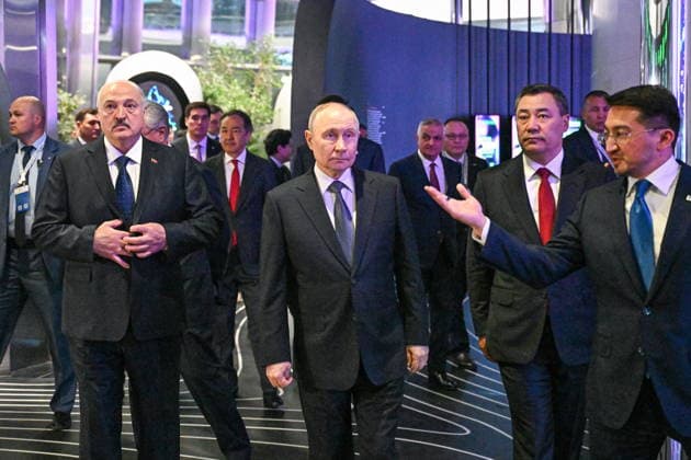 KAZAKHSTAN, ASTANA - MAY 28, 2026: Belarus President Alexander Lukashenko and Russia s President Vladimir Putin (L-R) attend an exhibition dedicated to IT projects of the Eurasian Economic Union (EAEU) member states at the Alem.ai International Artificial Intelligence Center Astana Kazakhstan  - ZUMAt113 20260528_zaa_t113_577 Copyright: xSergeixBobylevx