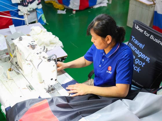 QINGDAO, CHINA - MAY 28: Workers are busy in front of an assembly line of flags for the FIFA World Cup at Qingdao Wonderful Flag Industry Co on May 28, 2026 in Qingdao, Shandong Province of China. As the 2026 FIFA World Cup is around the corner, production lines at a flag manufacturer in Qingdao, Shandong province, are running at full speed to produce various types of flags, many of which will soon appear in stadiums across North America.  Copyright: xVCGx 111644648666
