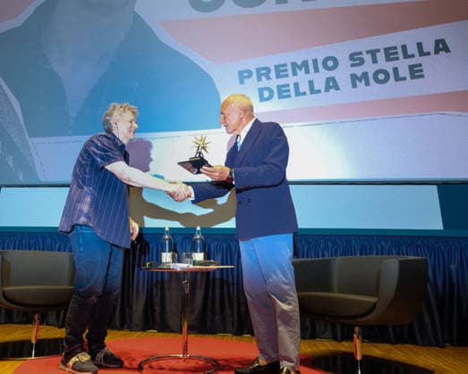 Michel Gondry Receives Stella Della Mole Award - Turin French director Michel Gondry receives the Stella della Mole award from National Cinema Museum president Enzo Ghigo at Cinema Massimo in Turin, Italy, on May 28, 2026, in recognition of his important and fundamental contribution to the art of filmmaking, while also holding a masterclass and introducing the screening of the film Microbo&Gasolina. Photo by Costantino Sergi IPA ABACAPRESS.COM Torino Torino  Copyright: xIPA ABACAx