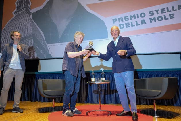 Michel Gondry Receives Stella Della Mole Award - Turin French director Michel Gondry receives the Stella della Mole award from National Cinema Museum president Enzo Ghigo at Cinema Massimo in Turin, Italy, on May 28, 2026, in recognition of his important and fundamental contribution to the art of filmmaking, while also holding a masterclass and introducing the screening of the film Microbo&Gasolina. Photo by Costantino Sergi IPA ABACAPRESS.COM Torino Torino  Copyright: xIPA ABACAx